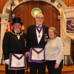 October 2017 – ImmediateR.W. Paul E. Kennedy (center) with his wife (right) and R.W. Scott D. Inglis after receiving the Joseph Warren Meritorious Service Award from the Grand Master.